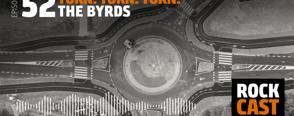 A traffic circle that is currently being built. Overlay text reads "Episode 52 Turn! Turn! Turn! The Byrds."